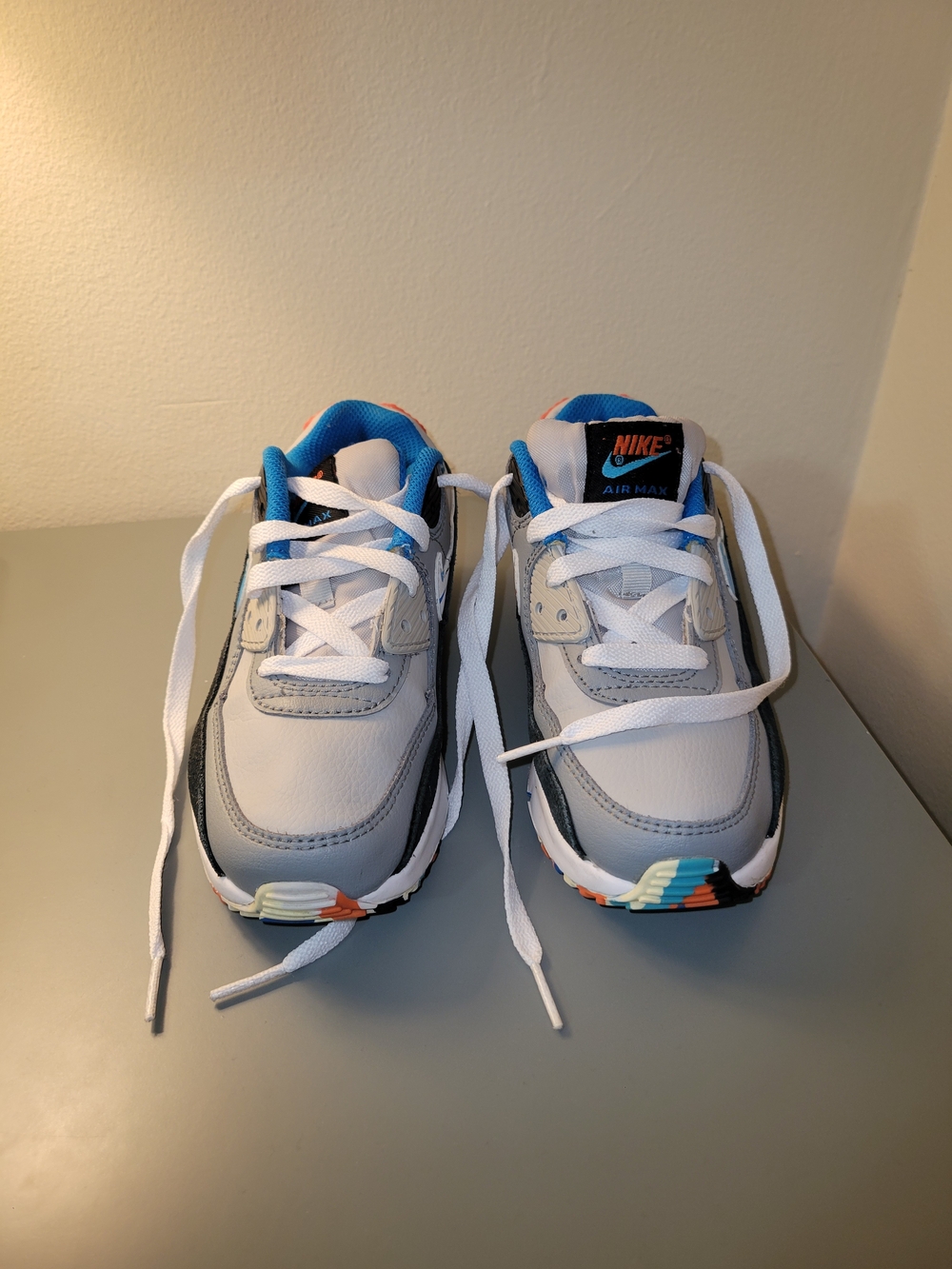 Nike AirMax90 Kids White and Gray Sneakers with Blue and Orange Accents